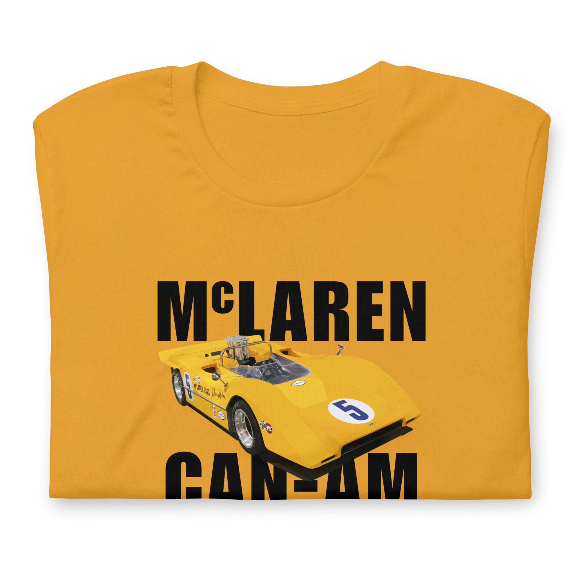 4: McLaren M8A Can Am Unisex T-shirt papaya front folded